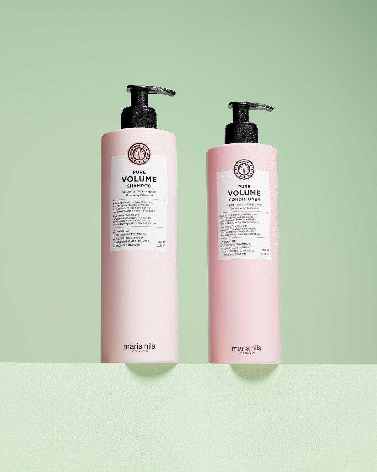 Pure Volume Shampoo flaska med lödder