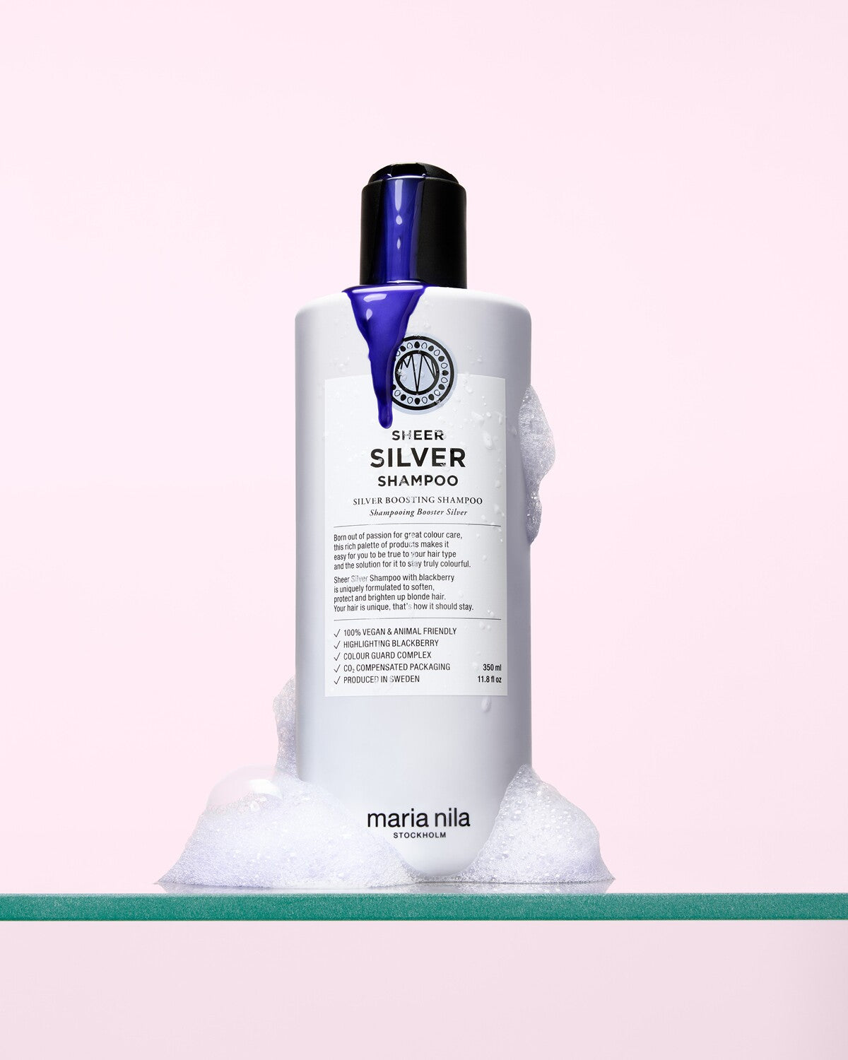 Sheer Silver shampoo flaska med lödder