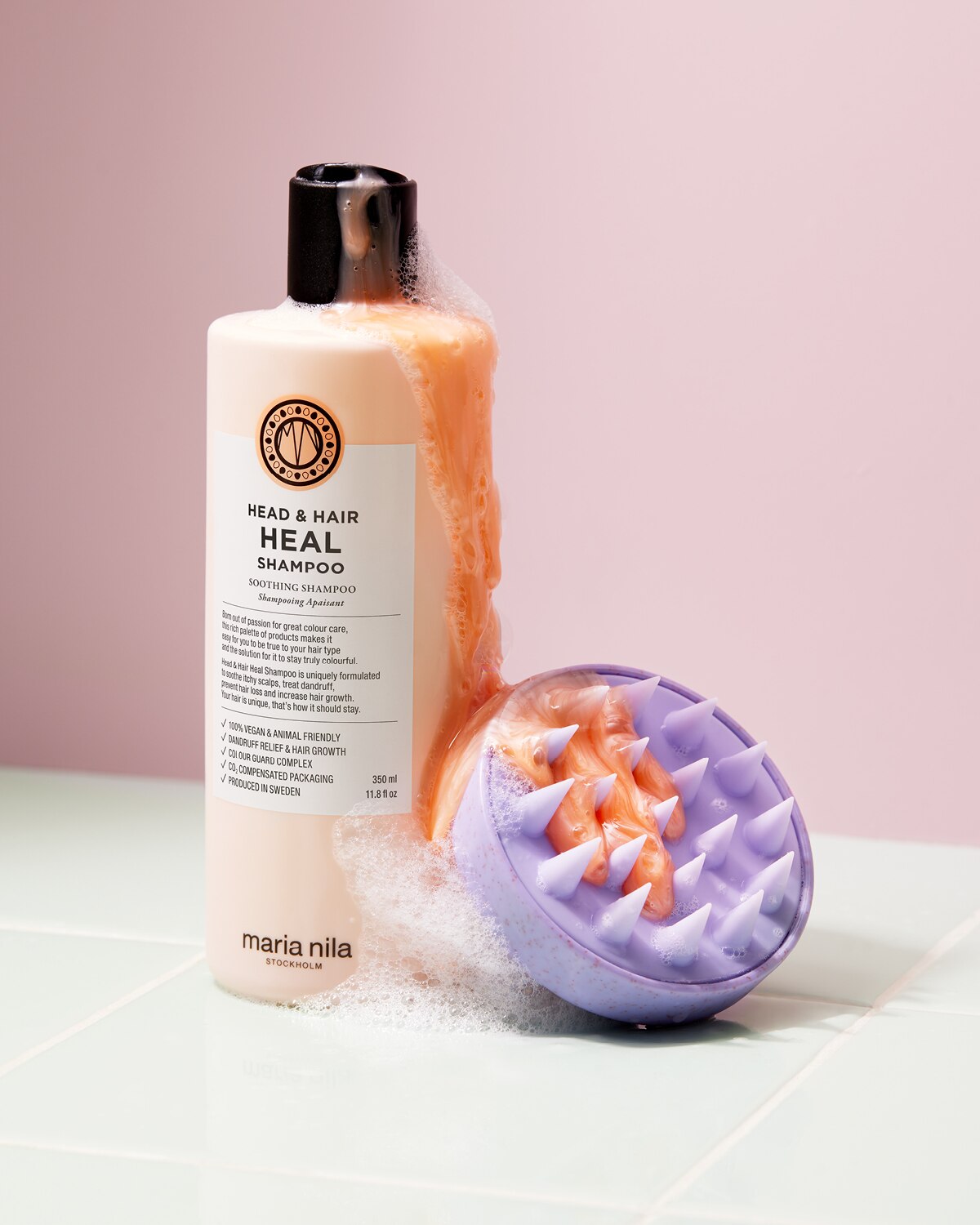 Head & Hair Heal Shampoo flaska med lödder