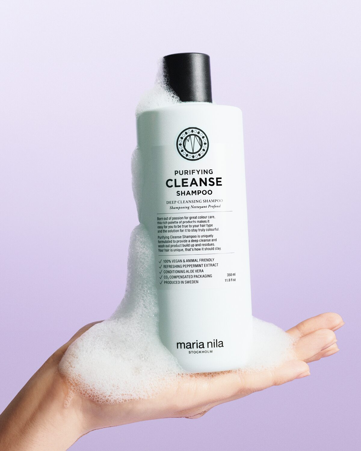 Purifying Cleanse Shampoo flaska med lödder