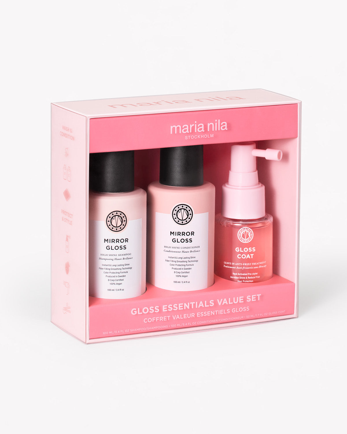 Gloss Essentials Set med två rosa flaskor och en sprayflaska i genomskinlig förpackning.