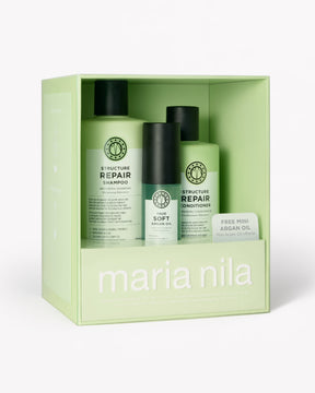 Maria Nila hårvårdspresentset i en ljust grön presentbox, med Structure Repair Shampoo, True Soft Argan Oil och Structure Repair Conditioner.