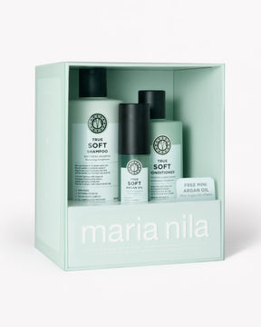 Maria Nila True Soft hårvårdsset i en mintgrön presentbox, med schampo, balsam och en Argan Oil-flaska.