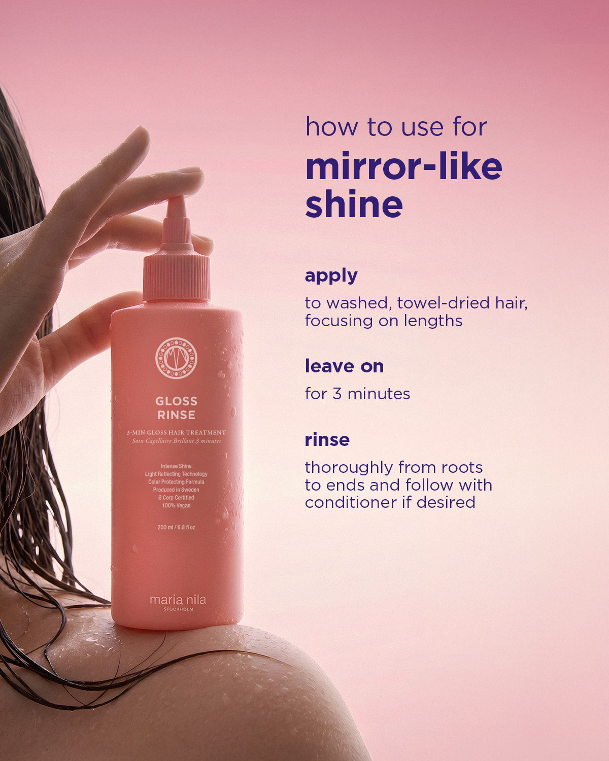Rosa plastflaska med pump, märkta Mirror Gloss Rinse, vårdande hårbehandling.