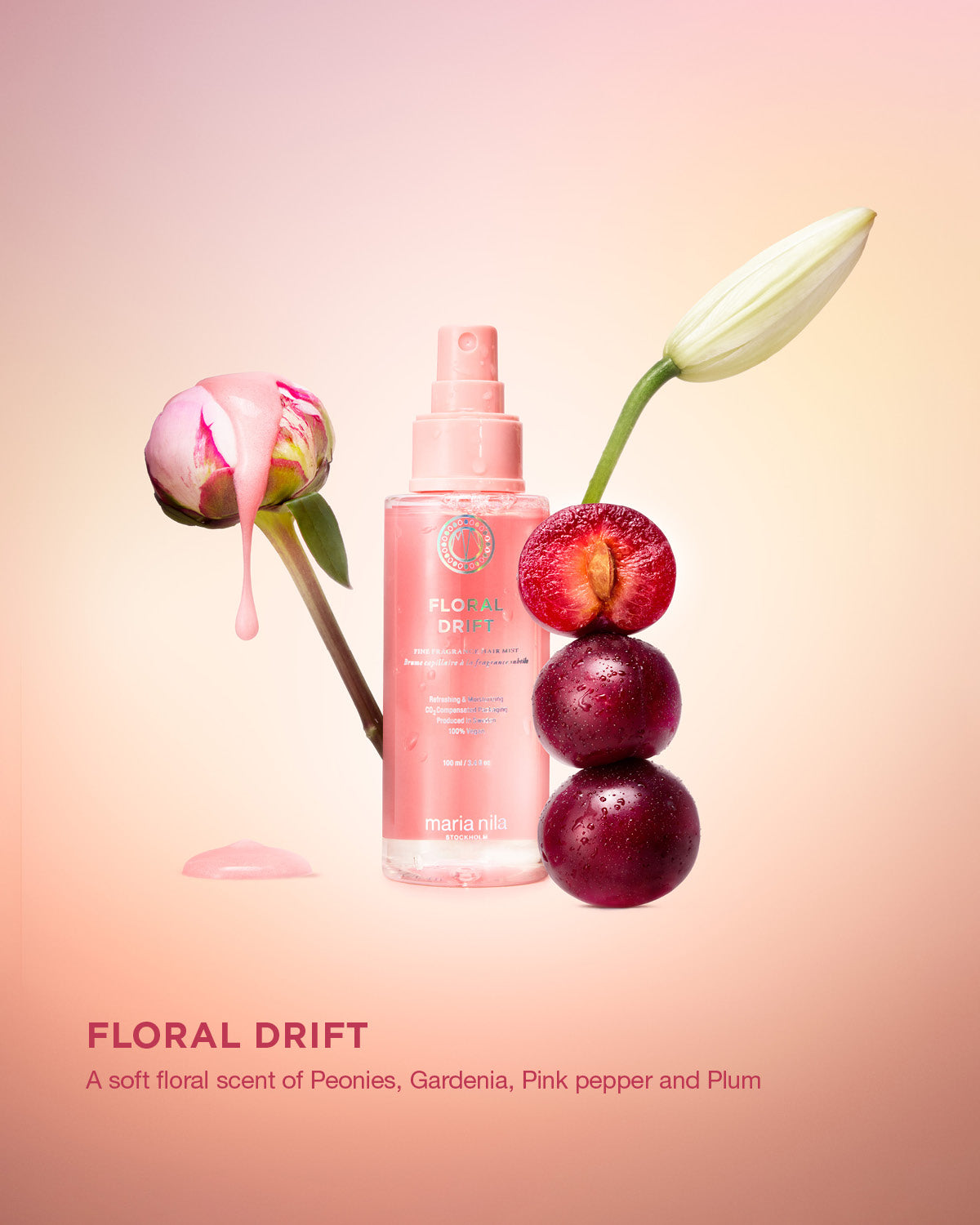 Maria Nila Floral Drift hårmist med pion, gardenia och plommon på rosa bakgrund